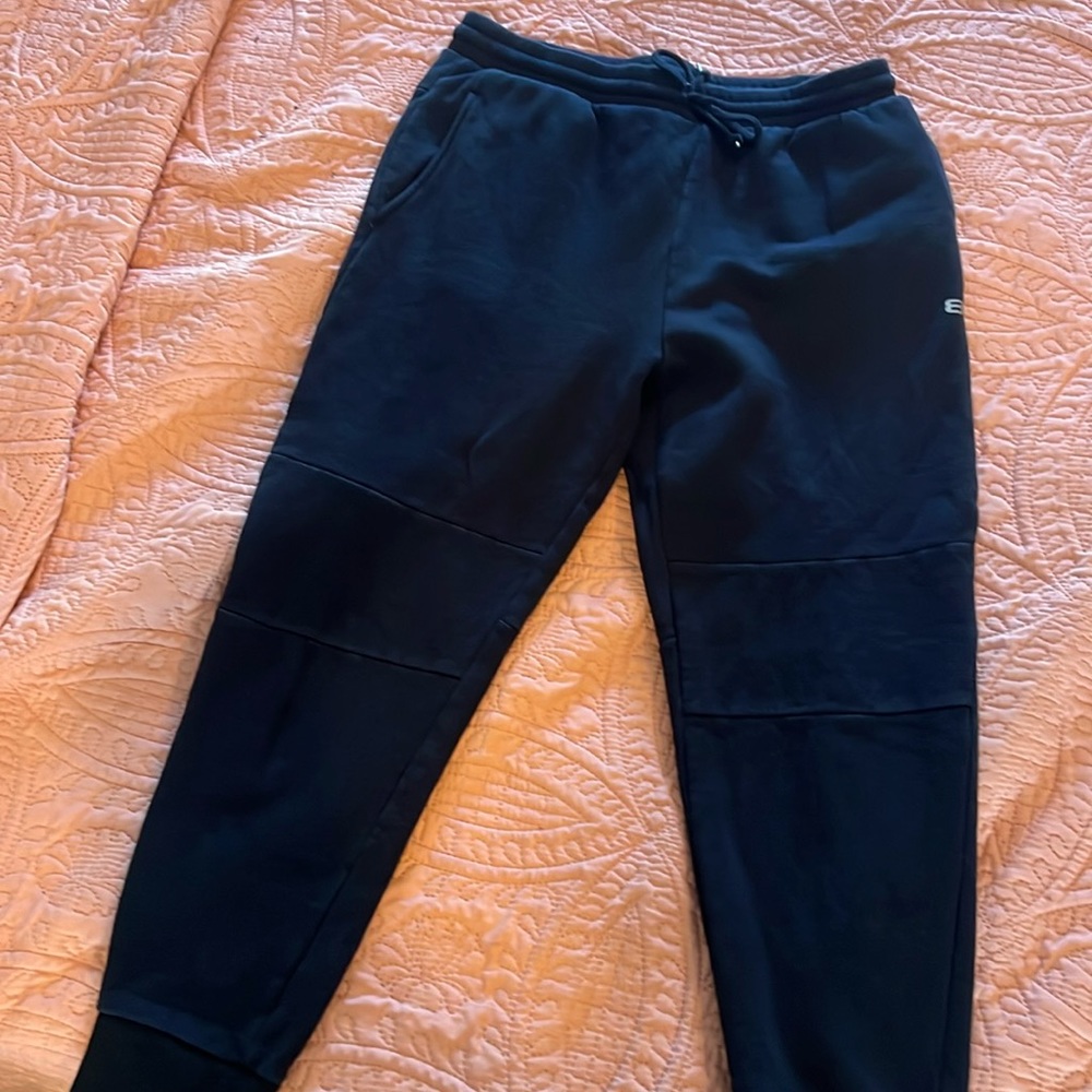 New never worn Layer 8, sweatpants black. SZ L waist laying flat 16” length 25”.